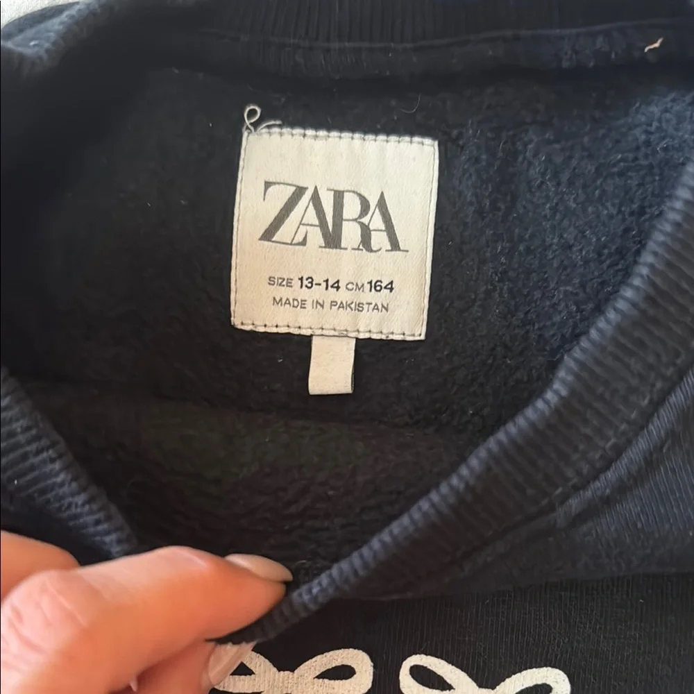 Zara Black Sweatshirt with White Bow Design